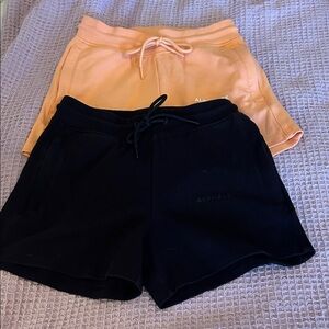 Alphalete Women's Athletic Shorts in Black and Peach-size small